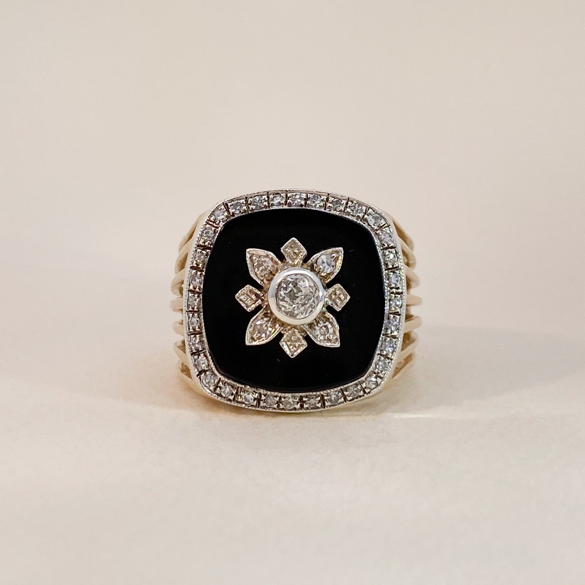 Bold onyx flower signet ring