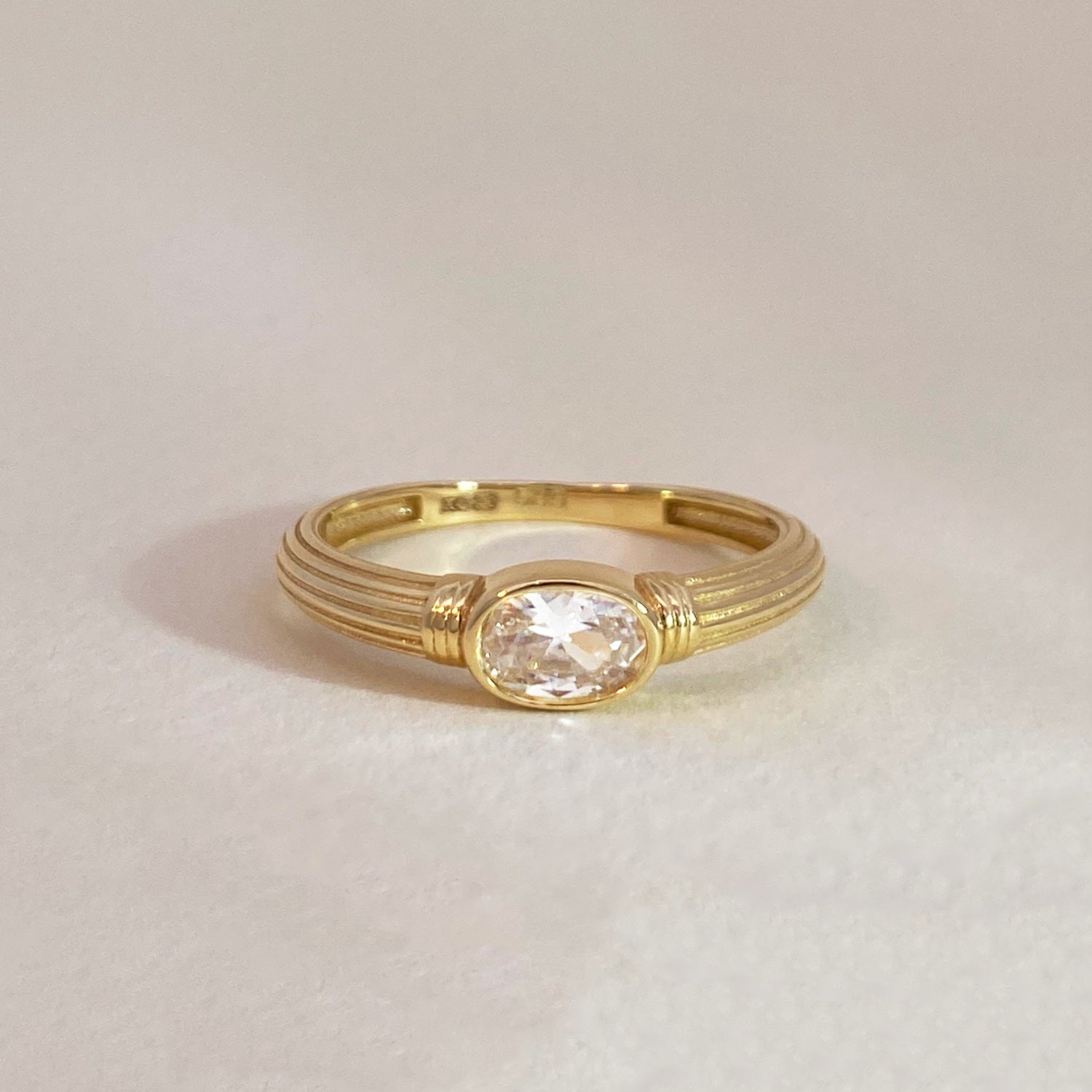 Oval crystal detail ring