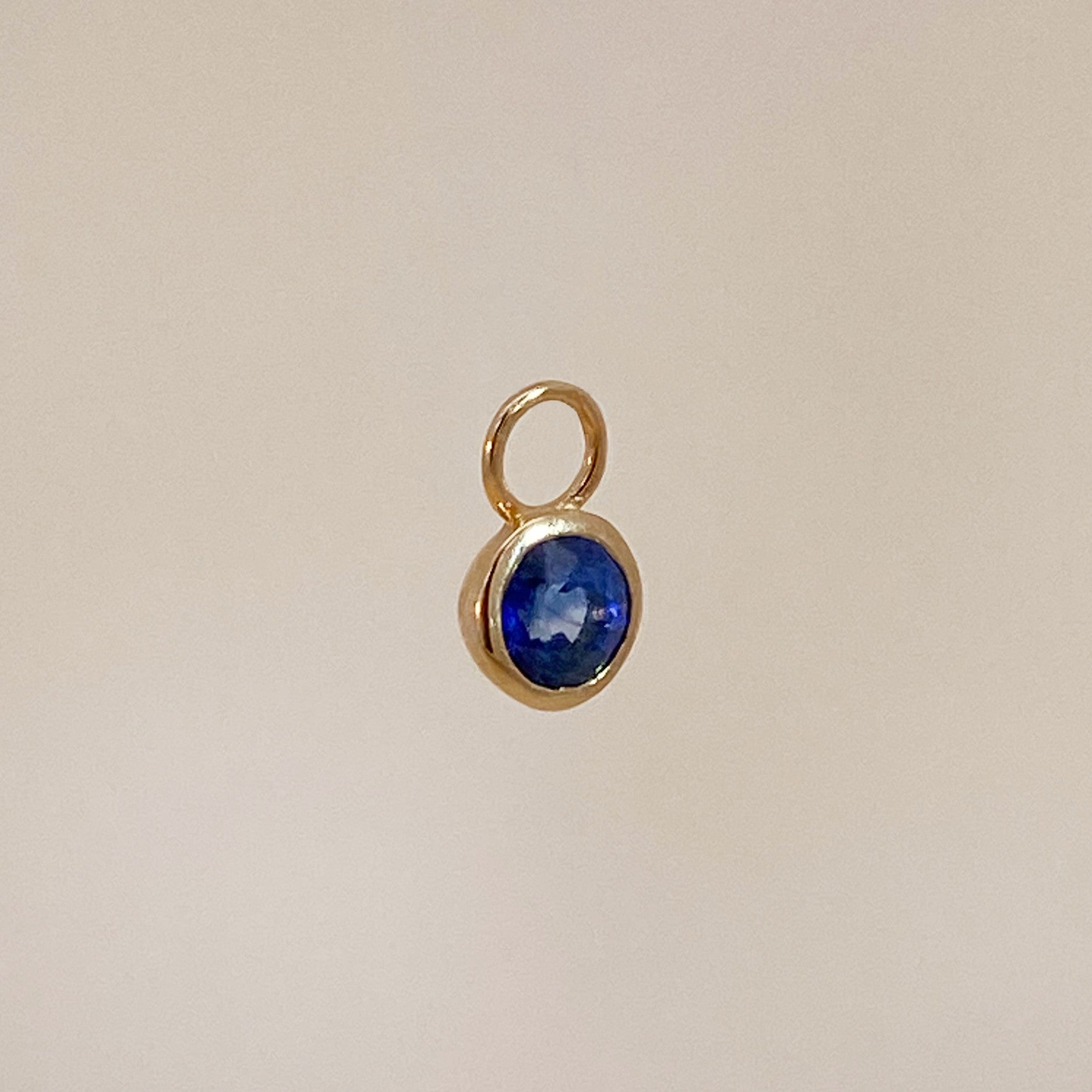 Sapphire charm