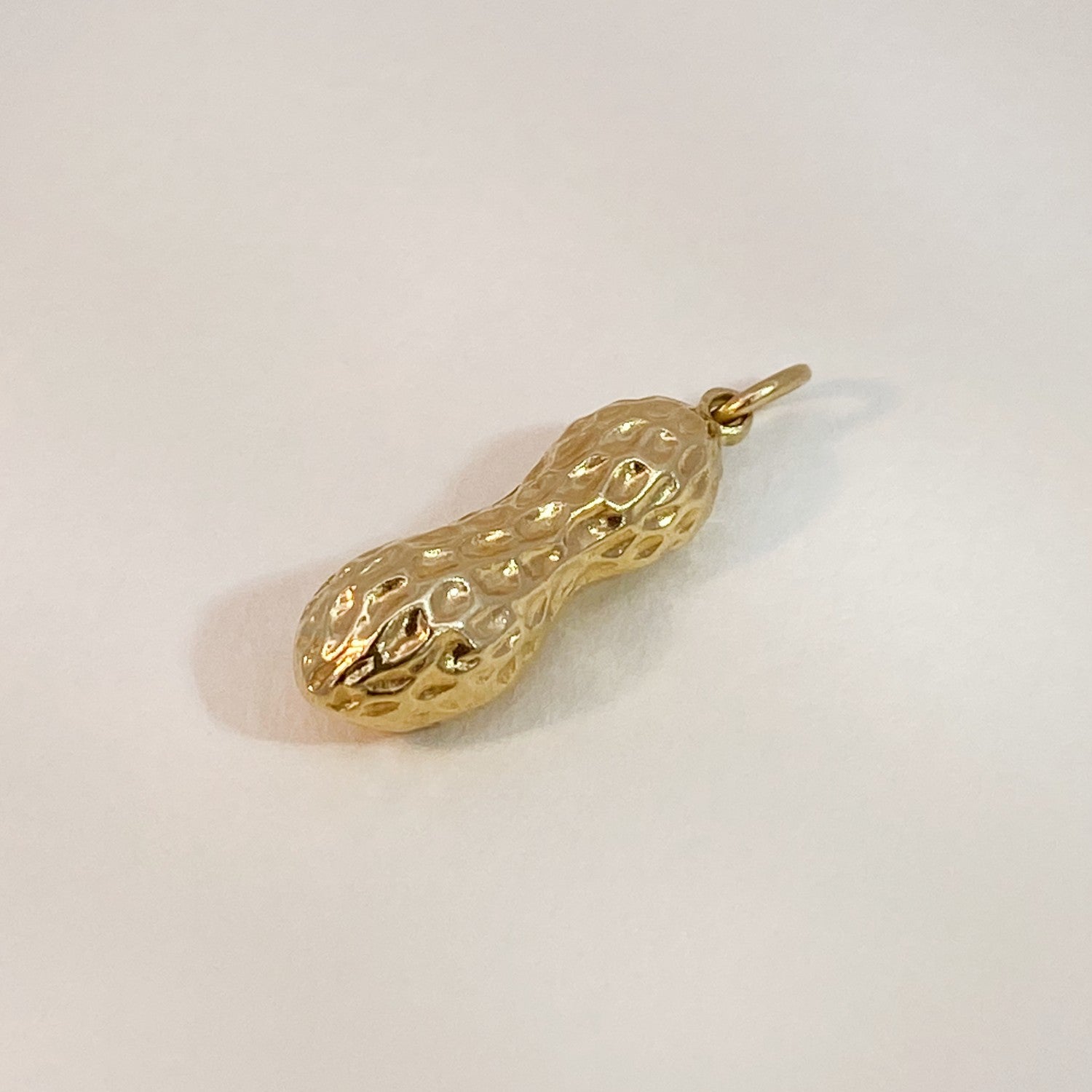 Vintage peanut pendant, 10 kt. gold, offers 1.5” L; Estate